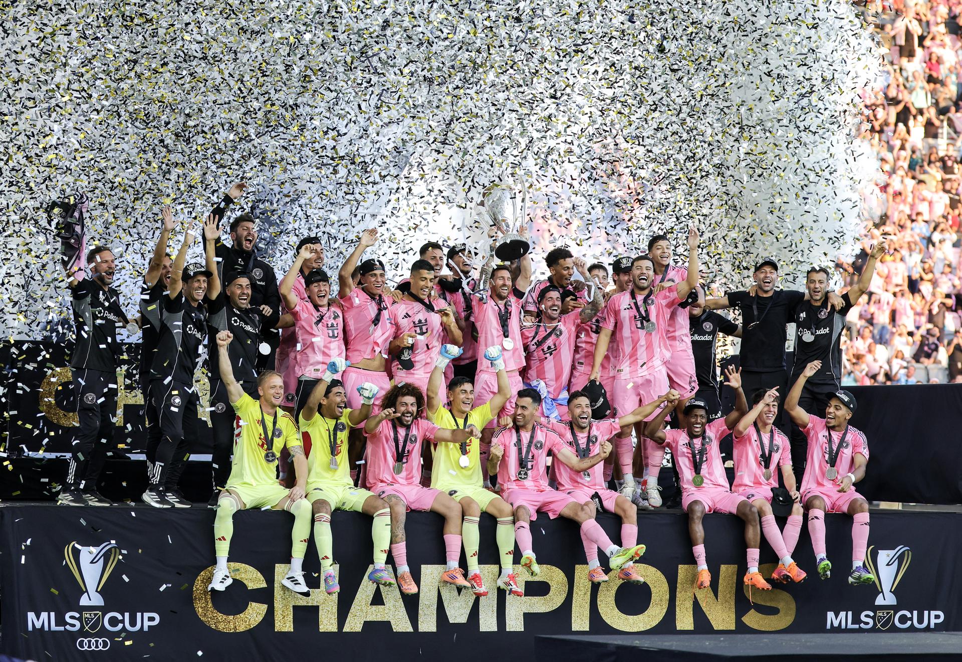 Players and technical team of Inter Miami CF celebrate with the MLS Trophy after winning the 2025 MLS Cup Final soccer match between Inter Miami CF and Vancouver Whitecaps FC, in Fort Lauderdale, Florida, USA, 06 December 2025. 