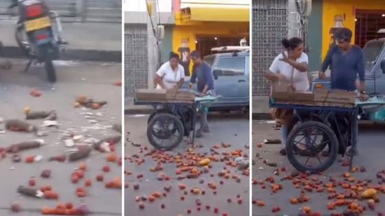 Mujer lanzando frutas y verduras en Santa Marta